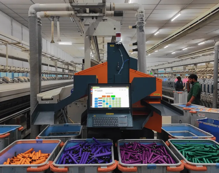 SortLink Magic bobbin sorter installed on an autowinder